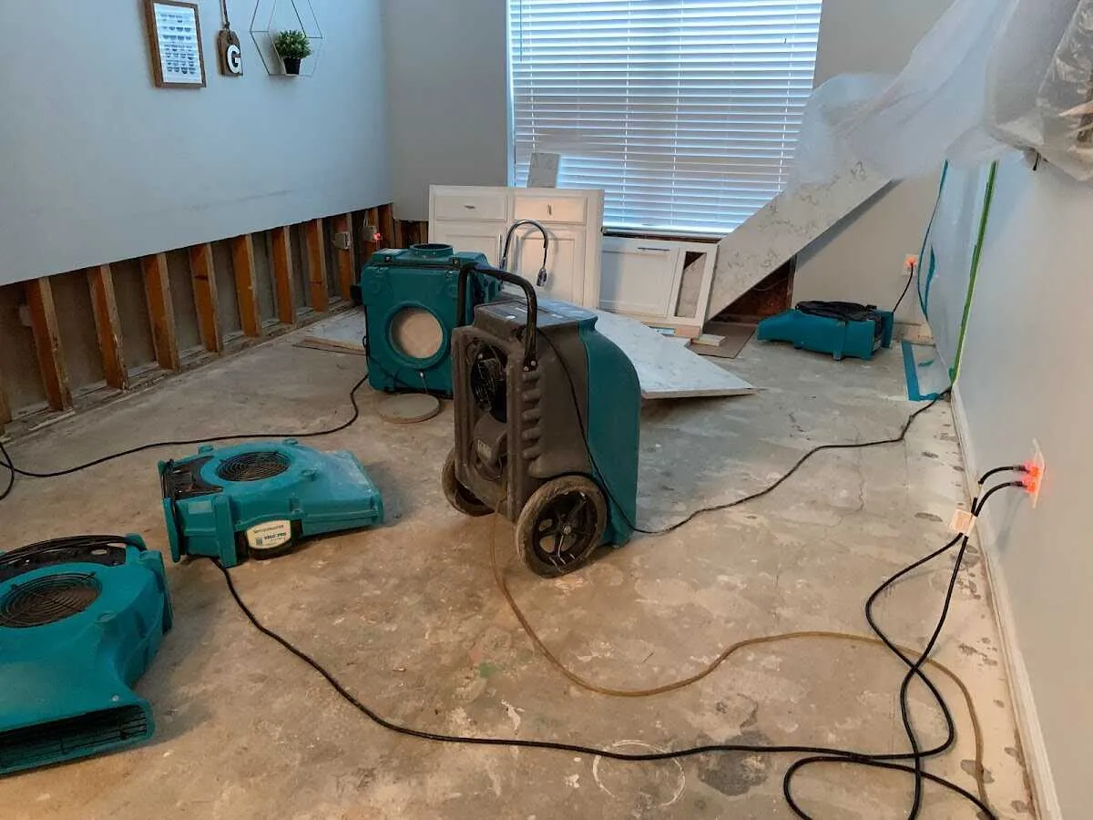 Dehumidifier in flood-cut room for Water Damage Restoration in Newport News